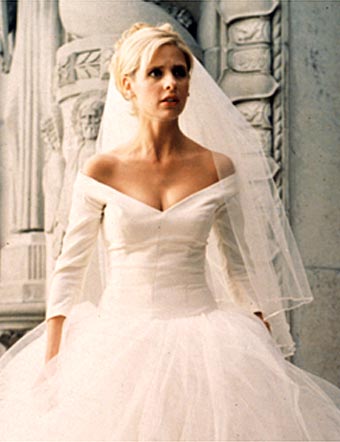 Buffy in a wedding dress. Are you surprised she looks nervous?