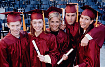 Graduation Day. Is maroon their colour? And why sateen?