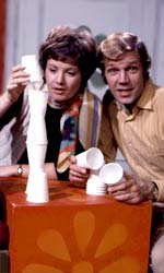 Brian Cant and Julie Stevens build a tower.