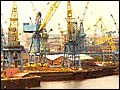 Link to interviews about changes in the shipyards (Image: dockside cranes)