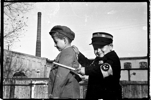 Playing as Ghetto Policeman, 1943 , Henryk Ross