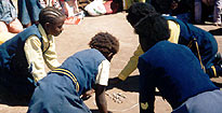 South African children playing Mapuko