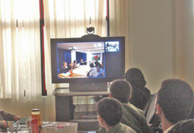 Pupils from Ysgol Dinas Bran video conferencing with schools in the Yemen
